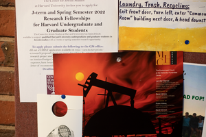 This is a poster board, most likely in a first-year dorm at Harvard. There are 335 places to poster on campus and our courier team gets to all of them.